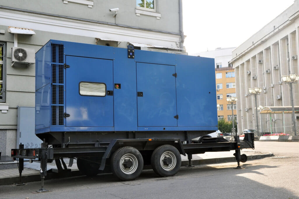 Blue standby mobile diesel generator for office building - Fuel Core generator refueling service